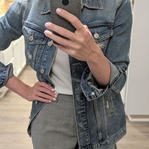 Distressed denim jacket